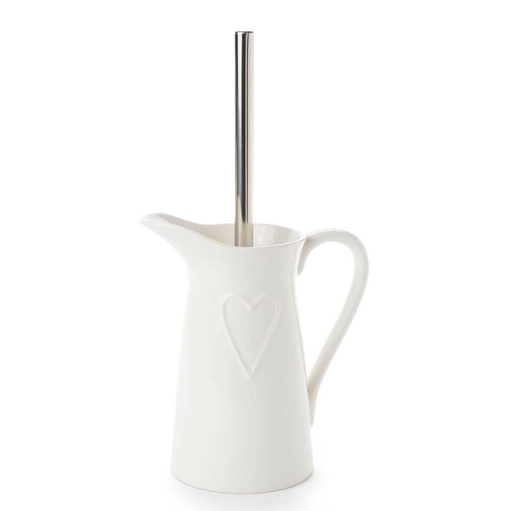 Toilet brush heart in white ceramic jug